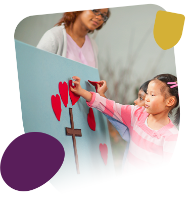 Teacher and pupil in front of pin board